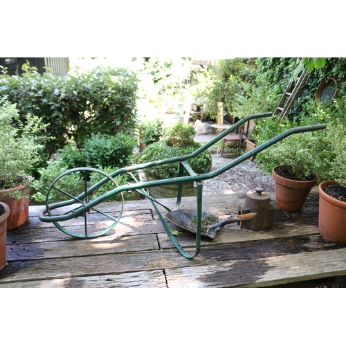 2057 - Metal wheel barrow frame, old shovel head, and antique cast iron meter cover, 141cm L and smaller