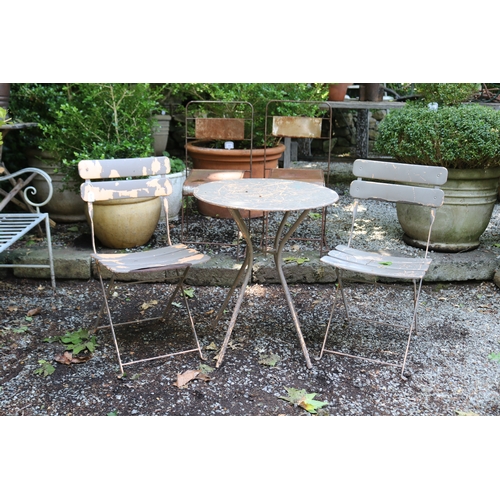 2078 - Circular metal four leg garden table along with a slat folding garden chair, table approx 60cm Dia x... 
