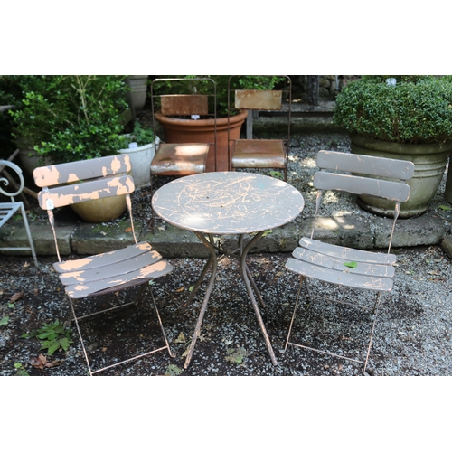 2078 - Circular metal four leg garden table along with a slat folding garden chair, table approx 60cm Dia x... 