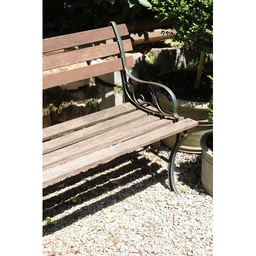 2090 - Cast iron end wooden slat garden bench, approx 122cm W