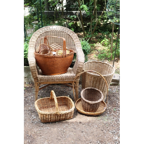 2598 - Cane arm chair, baskets, numerous small cane baskets