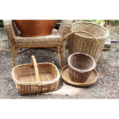 2598 - Cane arm chair, baskets, numerous small cane baskets