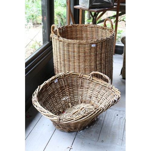 2599 - Large cylinder cane basket with twin handles, along with an oval basket, approx 63cm H ex handles x ... 
