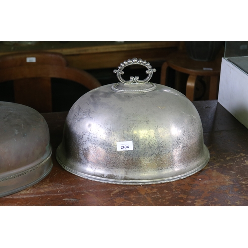 2604 - Antique silver plate meat dome, along with an antique copper example, approx 40cm W x 32cm D and sma... 