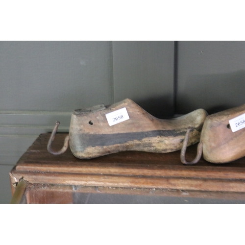2658 - Two antique wood and iron shoe lasts, approx 25cm L (2)