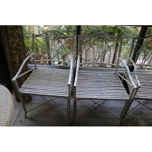 2703 - Set of four generous size painted bamboo arm chairs (4)