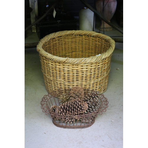 2718 - Large cane basket, along with wirework basket with pine cones, approx 44cm H x 66cm Dia