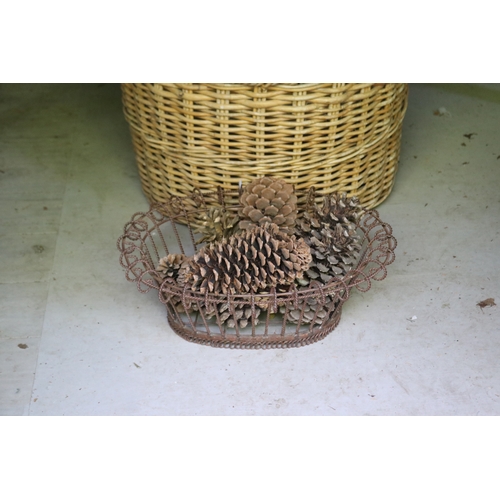 2718 - Large cane basket, along with wirework basket with pine cones, approx 44cm H x 66cm Dia
