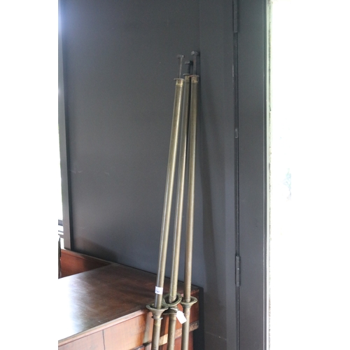 2740 - Three long brass coat poles, approx 190cm L each (3)