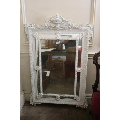1744 - Antique white painted cushion shape mirror, elaborate pierced crest with urn and foliage 138 cm high... 