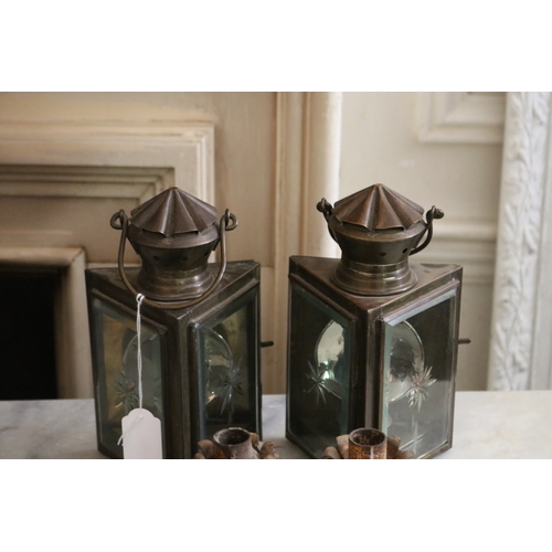 1747 - Pair of brass corner shape oil lamps, cut glass panels, along with a pair of metal pine cone candles... 