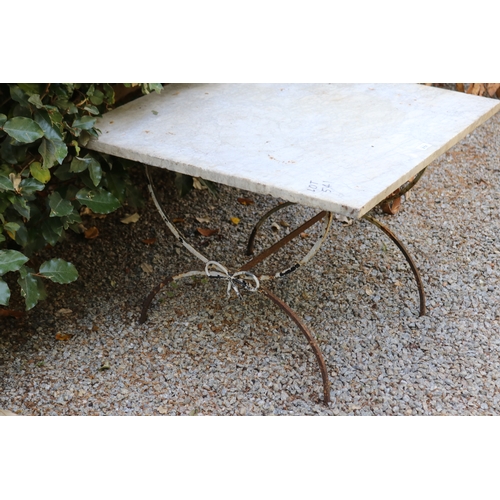 2751 - Marble topped X frame iron based garden table, approx 71cm D x 76cm W x 54cm H