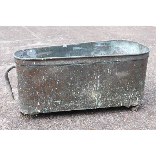 2097 - Antique French copper bath on castors, approx 64cm H x 132cm L x 59cm W
