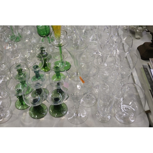 2278 - Assortment of various glassware to include champagnes and wines etc, some etched and some coloured, ... 