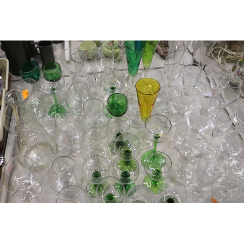 2278 - Assortment of various glassware to include champagnes and wines etc, some etched and some coloured, ... 