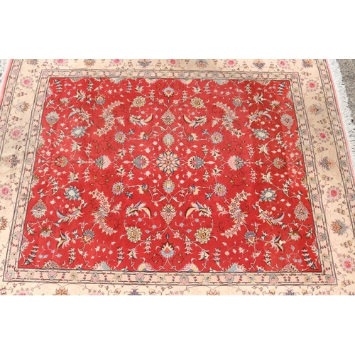 2349 - Fine quality Iranian rug - wool and silk hand knotted carpet, central red field with ivory border, a... 