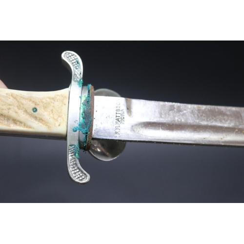 2368 - Swedish dress bayonet with scabbard and frog. 33cm overall with 20cm single edged blade by Mattson o... 