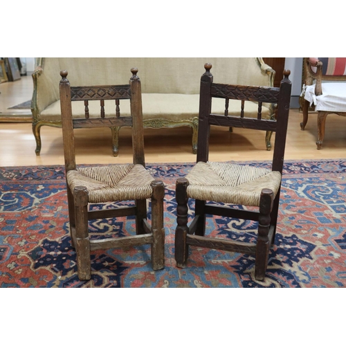 2403 - Two similar antique late 17th century or early 18th century Spanish rush seated chairs, each approx ... 