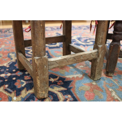 2403 - Two similar antique late 17th century or early 18th century Spanish rush seated chairs, each approx ... 