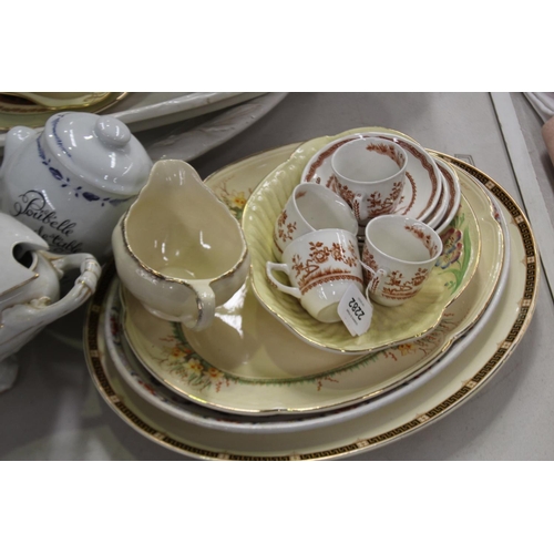 2282 - Large assortment of porcelain and ceramics to include large serving trays etc, approx 64cm W and sma... 