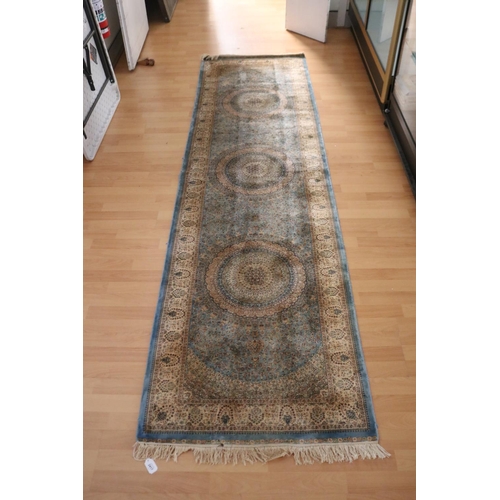 2417 - Fine Pale blue ground silk carpet, approx 79cm x 290cm