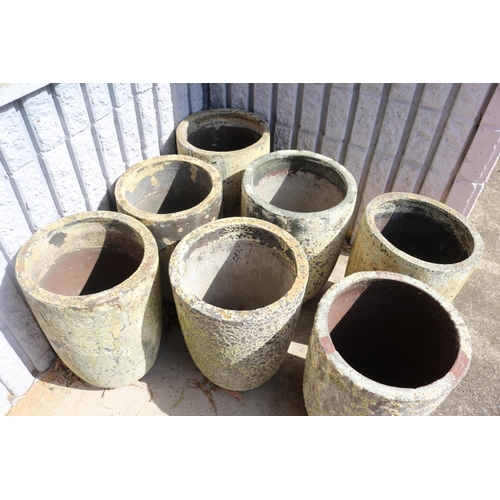2436 - Set of seven composite stone garden planters in a vase form, approx 50cm H (7)