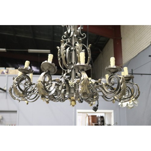 2451 - Large black painted twelve light iron chandelier