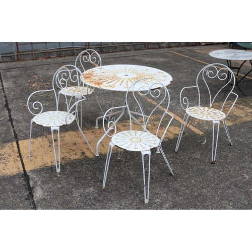 39 - Vintage French garden suite, to include circular topped garden table & set of four chairs, table app... 
