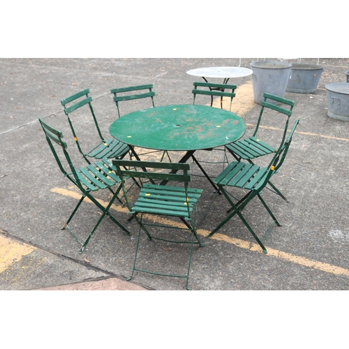 27 - Vintage French green painted garden suite to include circular garden table with a set of seven woode... 