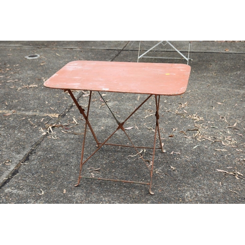 49 - French iron garden table, with red/orange painted finish, approx 72cm H x 90cm W x 59cm D