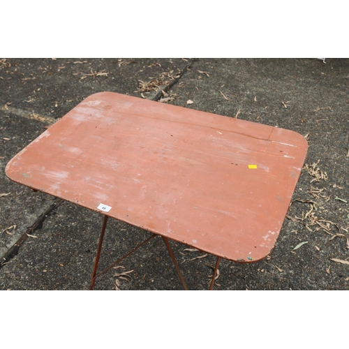 49 - French iron garden table, with red/orange painted finish, approx 72cm H x 90cm W x 59cm D