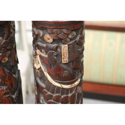 221 - Pair of Meiji period tall carved bamboo brush pots depicting two warring Samurais on horseback. Bone... 