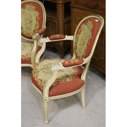 217 - Pair of French Louis XVI style armchairs, painted frames and upholstered in wool work to the backs a... 