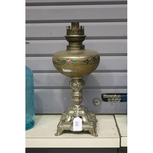 228 - Antique French oil lamp with painted reservoir and plated base, approx 36cm H