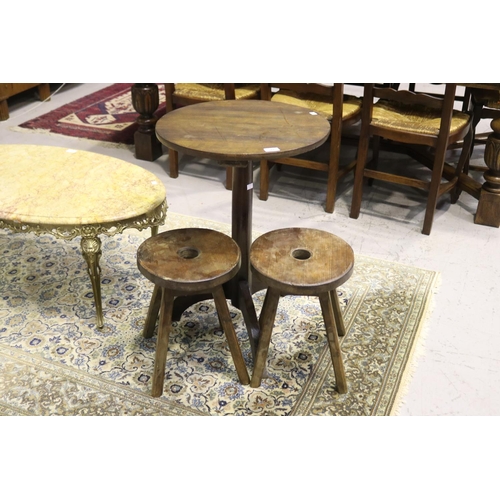 247 - Small antique French rustic pedestal table and two small stools, approx 73cm H x 51cm Dia and smalle... 