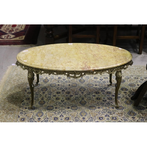 248 - Oval marble topped pierced brass coffee table, approx 42cm H x 100cm W x 57cm D