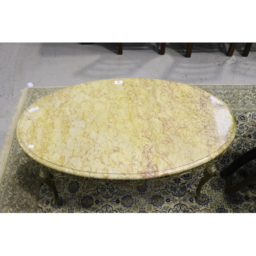 248 - Oval marble topped pierced brass coffee table, approx 42cm H x 100cm W x 57cm D