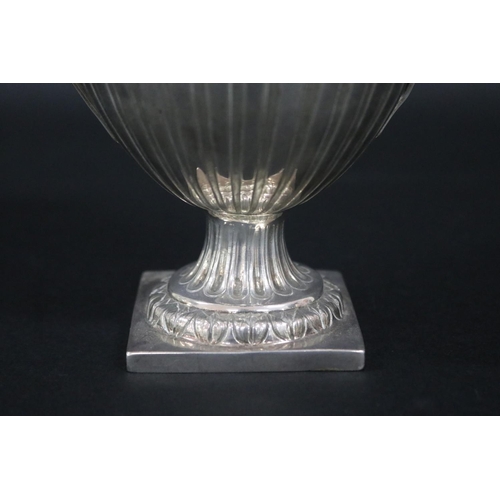 458 - Sterling silver pedestal twin handled cup, approx 15cm H x 17cm W and approx 315 grams excluding gla... 