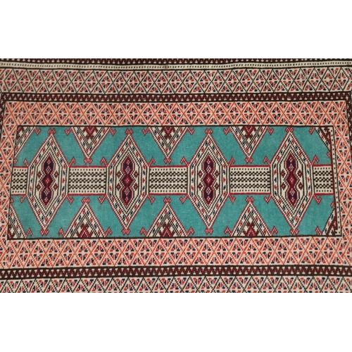 398 - Small handwoven wool carpet, approx 63cm x 92cm