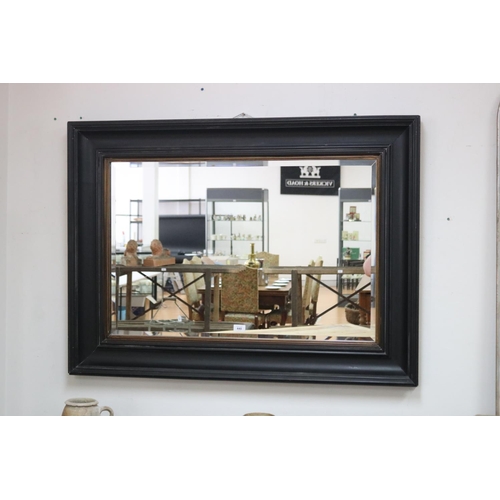 448 - Black painted frame rectangular mirror, approx 85cm x 115cm