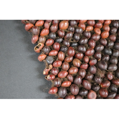 482 - Liza Pultara, (Australian Aboriginal deceased) bead mat woven with human hair & beans, 1970s, Anmatj... 