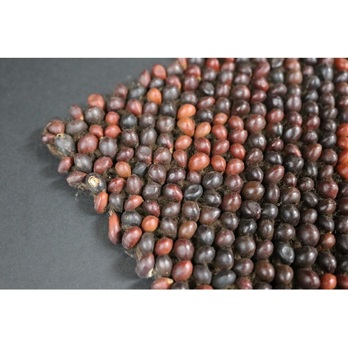 482 - Liza Pultara, (Australian Aboriginal deceased) bead mat woven with human hair & beans, 1970s, Anmatj... 