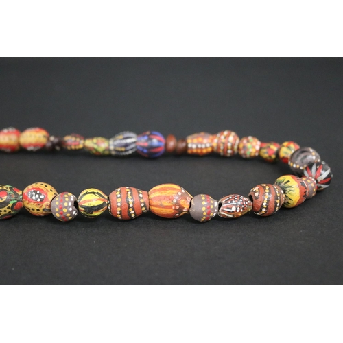486 - Lisa Pultara (c1959-.) Australia (Aboriginal) (deceased) painted beads, bean tree & gumnut, 1987, An... 