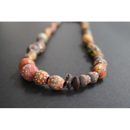 486 - Lisa Pultara (c1959-.) Australia (Aboriginal) (deceased) painted beads, bean tree & gumnut, 1987, An... 