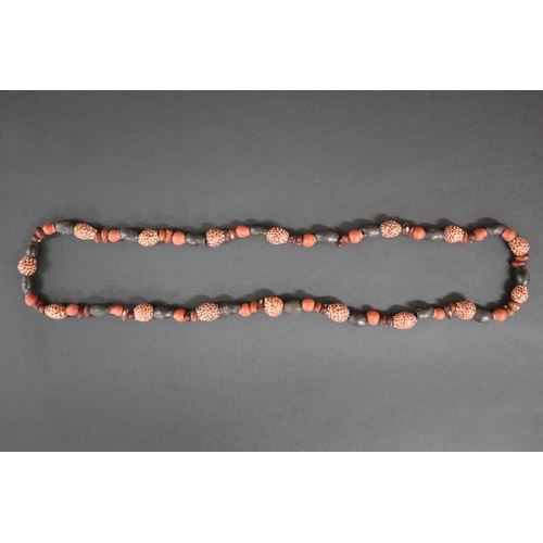 487 - Lisa Pultara (c1959-.) Australia (Aboriginal deceased) Painted beads, bean tree & gumnut, 1987, Anma... 