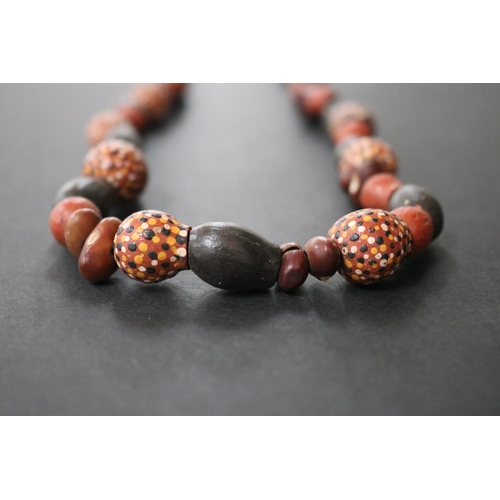 487 - Lisa Pultara (c1959-.) Australia (Aboriginal deceased) Painted beads, bean tree & gumnut, 1987, Anma... 