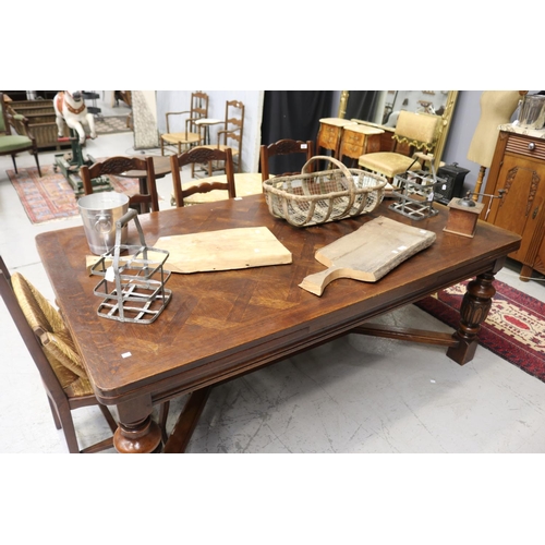 246 - Large early 20th century French oak table, with drawer leaves to the ends. All standing on carved ba... 