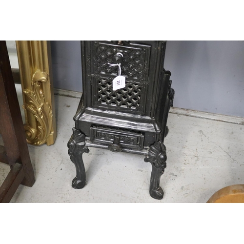 251 - Petit antique French black enamelled iron pedestal, wood burning room heater, approx 60cm H