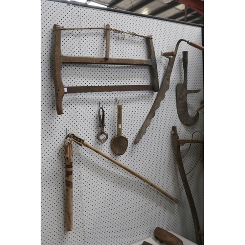391 - Huge assortment of antique tools, to include saws etc, approx 202cm H x 80cm W and smaller