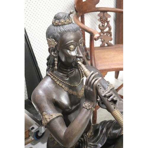 393 - Asianesque large size bronze seated figure, playing instrument, approx 90cm H x 70cm W x 56cm D